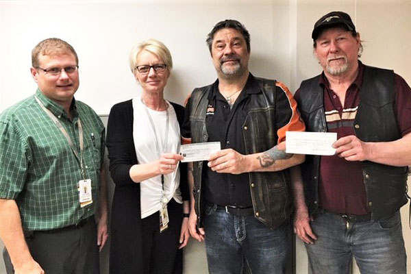 Pictured from left are Curt Gullett, DRHC Director, Jean Ann Fisher, DRHC Care Team Manager, John Dulewich and Tony Shewchuk.